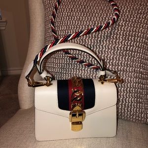 Authentic GUCCI purse used once for an event.